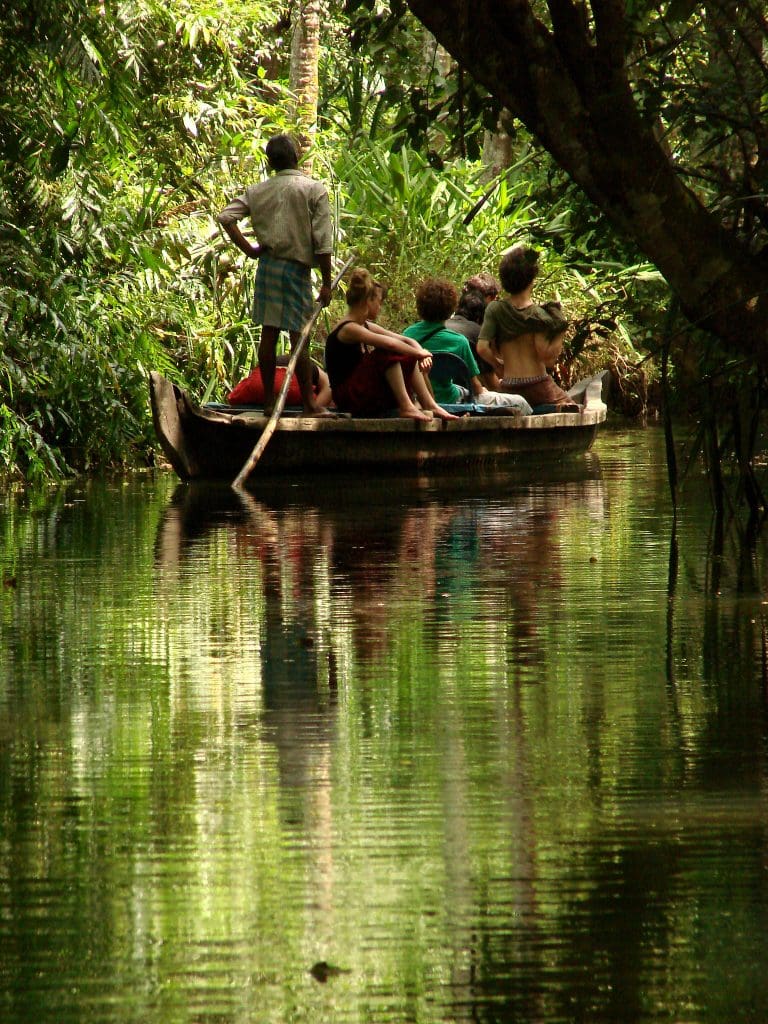 Tourists_Take_Boat_Trip_through_Backwaters_of_Kerala