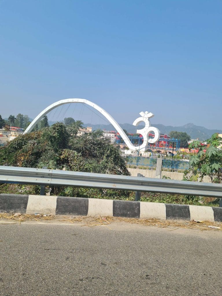 Rishikesh and Haridwar - top trips of 2022 for epic faith and spiritual calling 19 Visit Rishikesh and Haridwar
A-giant-Om-arches-across-a-bridge-to-welcome-visitors-to-Haridwar
