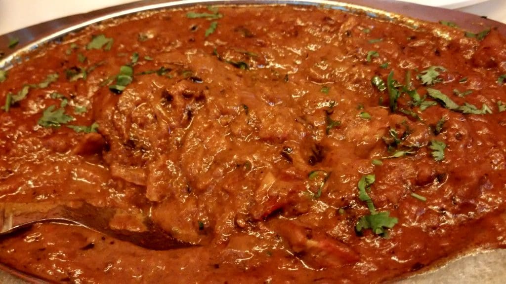 A shot of butter chicken masala 10 of the best street food in Delhi