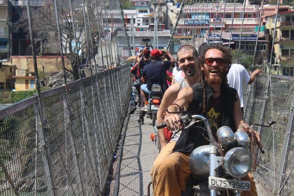Visit Rishikesh and Haridwar  
Bike riders on ancient bridges in Rishikesh 