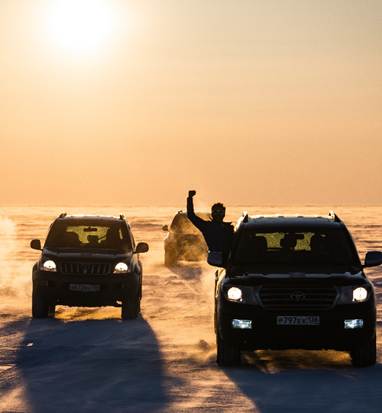 SUV rally on frozen lake Baikal 