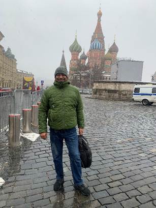 Standing in front of Kremlin and on the Moskva River cruise