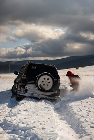 SUV stuck in heavy snow in Barguzine Valley