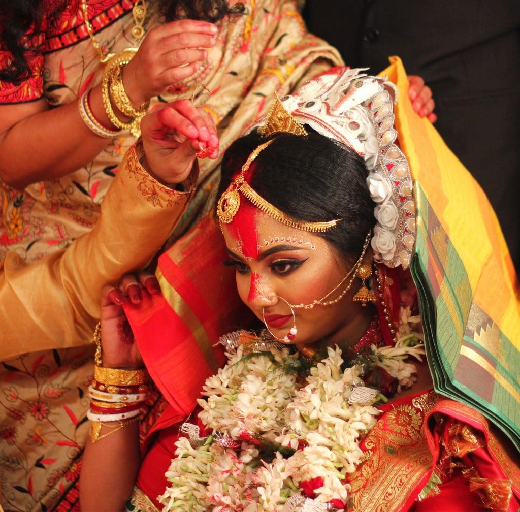 Bengali wedding - bride during sindoor daan - pix courtesy Sumita Roy Dutta