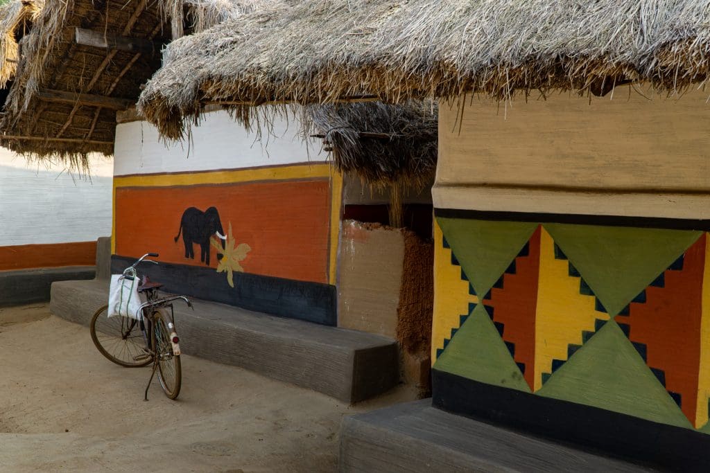 Local painted motifs on the wall of a tribal Santal house 1 Svanir Wilderness Homestay amidst 1000 trees and wonderful tribal Santal lifestyle