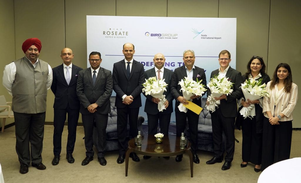 Kush Kapoor, CEO, Roseate Hotels & Resorts (4th from left) with Christoph Schnellmann, Chief Executive Officer, Noida International Airport (third from the right) and Kiran Jain, COO, Noida International Airport (2ndfrom right) for signing of MoU along with other executives of the Bird Group and NIAL