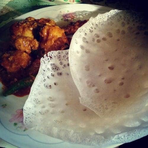 Christmas feast with Appam and Chicken Courtesy Haneyljacob