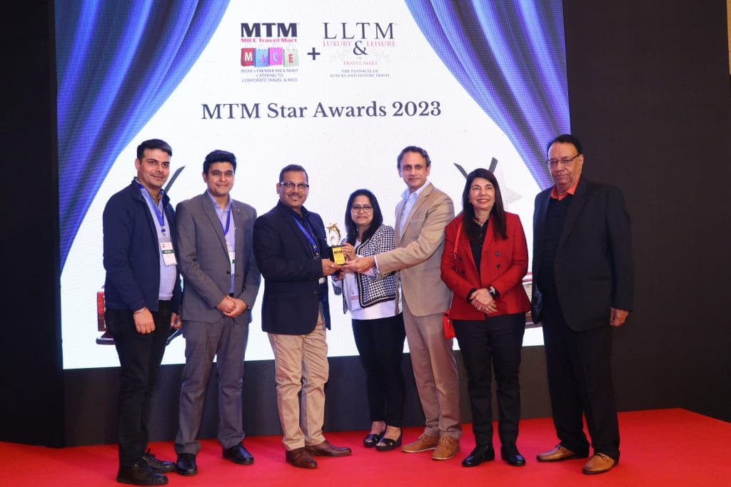 Aishvarya Guhagarkar and Hemant Mediratta giving away MTM Star Awards 2023