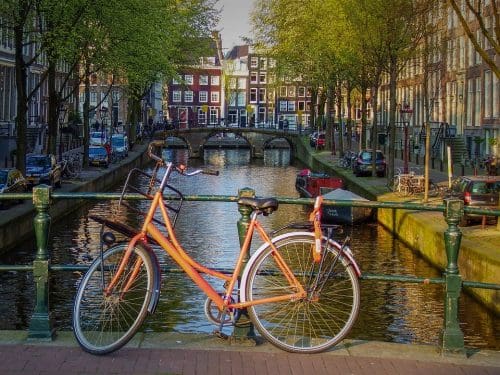  Stunning global cycling destinations - Netherlands Street Amsterdam Bridge 