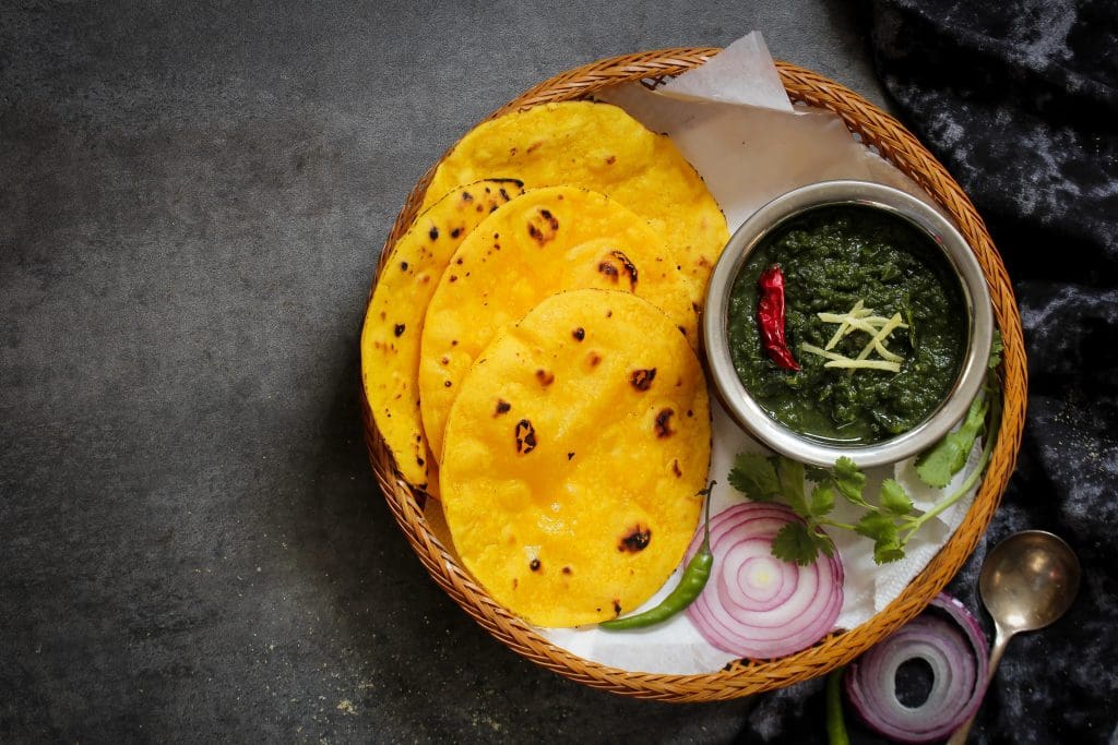 Sarson ka saag and Makki ki roti /Indian Punjabi corn bread with mustard leaves curry