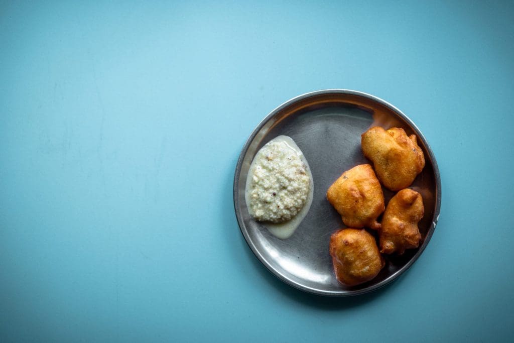 Indian delicious deep fried Mysore bonda with chutney Image courtesy GopalKrishna  Wikipedia Commons