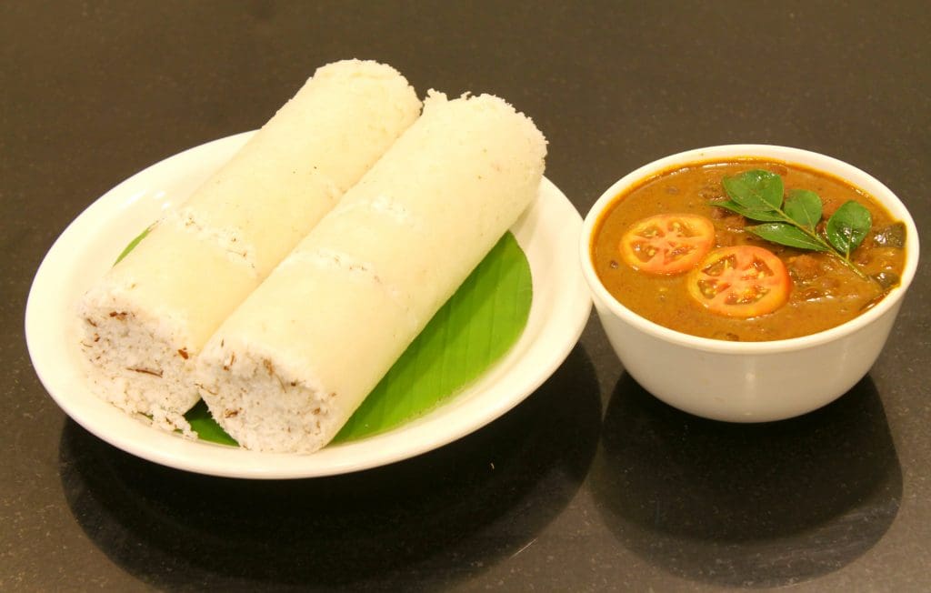Puttu with Kadala curry - Image courtesy Jackson John 10 via Wikipedia Commons