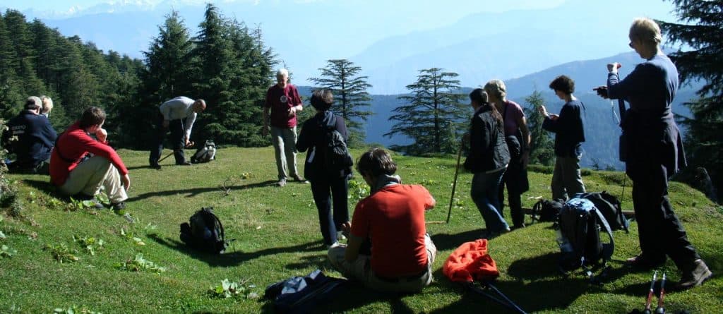 Trekkers resting on the way to Sandakphu peak West Bengal   