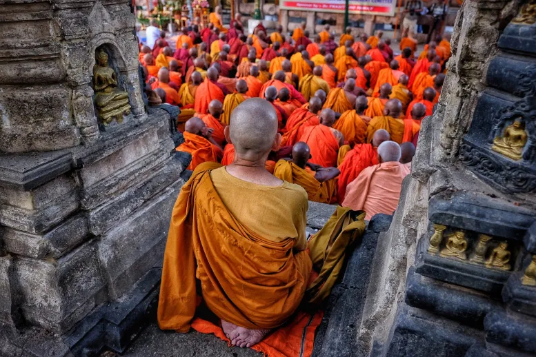 Temples in Bihar: Monks gather in prayer at  Mahabodhi Temple at Bodh Gaya, Bihar 