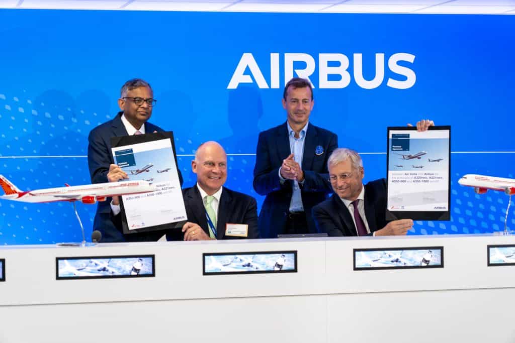 Left to right: N. Chandrasekaran, Chairman of Tata Sons and Air India, Campbell Wilson, CEO & MD, Air India, Guillaume Faury, CEO, Airbus, and Christian Scherer, Chief Commercial Officer and Head of International, Airbus