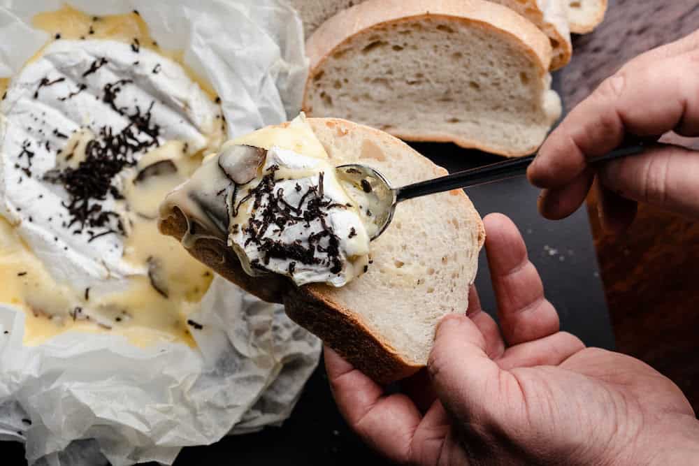 Truffle season is in full swing - 3 great truffle recipes, delicious tastings and truffle hunts 8 Truffle Recipes: Baked Truffle Brie using fresh black truffles (Image: Sarah Hewer)