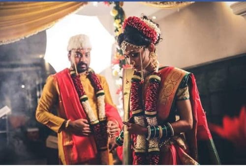 Traditional wedding in Maharashtra. Saptapadi in Marathi wedding bride and groom take 7 round around the fire and 7 promises to each other.Image courtesy Harshal Chopkar via Wkipedia Commons