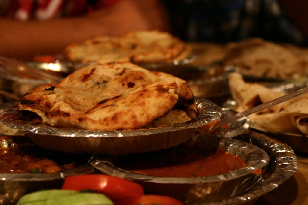 Amritsari Kulcha (12 Must-Try Punjabi Food Dishes Beyond Butter Chicken)
Image Credit: Prateek Rungta from Delhi, India, CC BY 2.0 via Wikimedia Commons