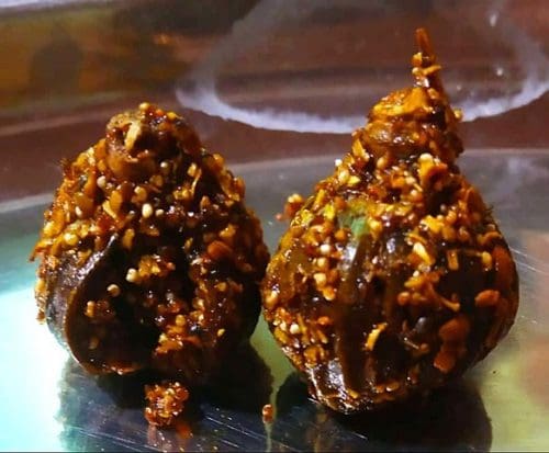 Dode ki Sabji:  this is Baby Opium fruit before extract opium from it, just fry it and eat it, its traditional recipe & found only in few places in western MadhyaPradesh Rajasthan border. Image courtesy: Chotes9 via Wikipedia Commons