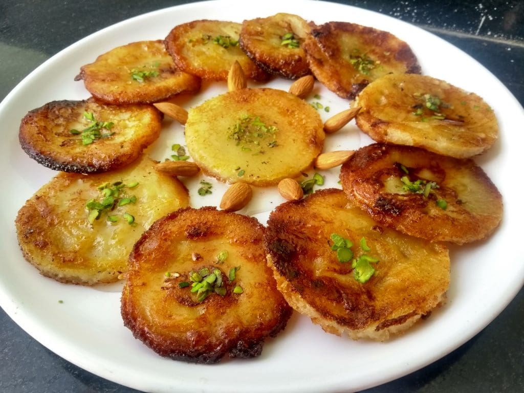Lucknow Street Food: Mawa Malpua Sweet 
Image Credit: Patelaahil, CC BY-SA 4.0 via Wikimedia Commons