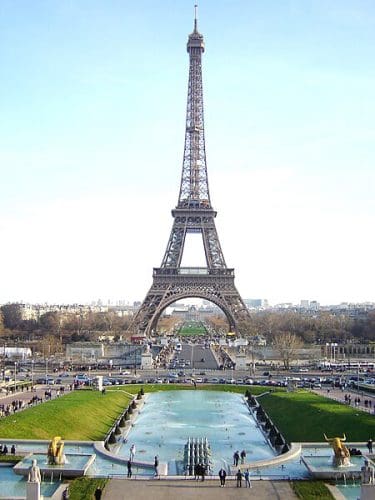 Eiffel Tower in Paris-France New York City Times Square, (Urban Luxuries and the Glitter of December Festivities)