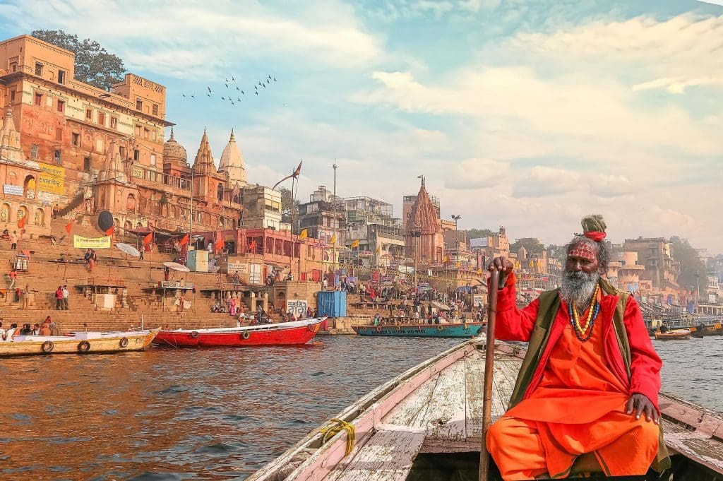 Sadhu on a boat in Ganges (Sacred Varanasi)
