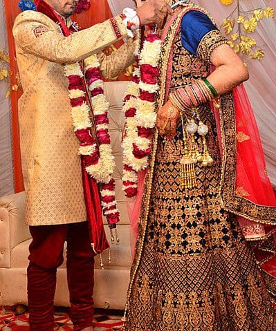 The Varmala Ceremony, also referred to as Jaimala, serves as the first time the Bride and Groom meet before starting the wedding ceremony. Mala is the Hindi word for garland. Image courtesy: Kashish1711 via Wikipedia Commons