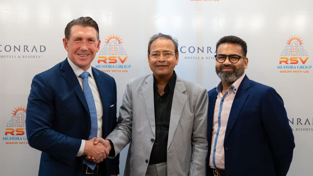 Hilton enhances luxury Portfolio in India, welcomes Jaipur’s first Conrad Hotels and Resorts 2 From Left to Right – Alan Watts, President, Asia Pacific, Hilton, Rajendra Mundra, Managing Director, SunnyRaj Properties Pvt Ltd., Sunny Mundra, Director, SunnyRaj Properties Pvt Ltd.