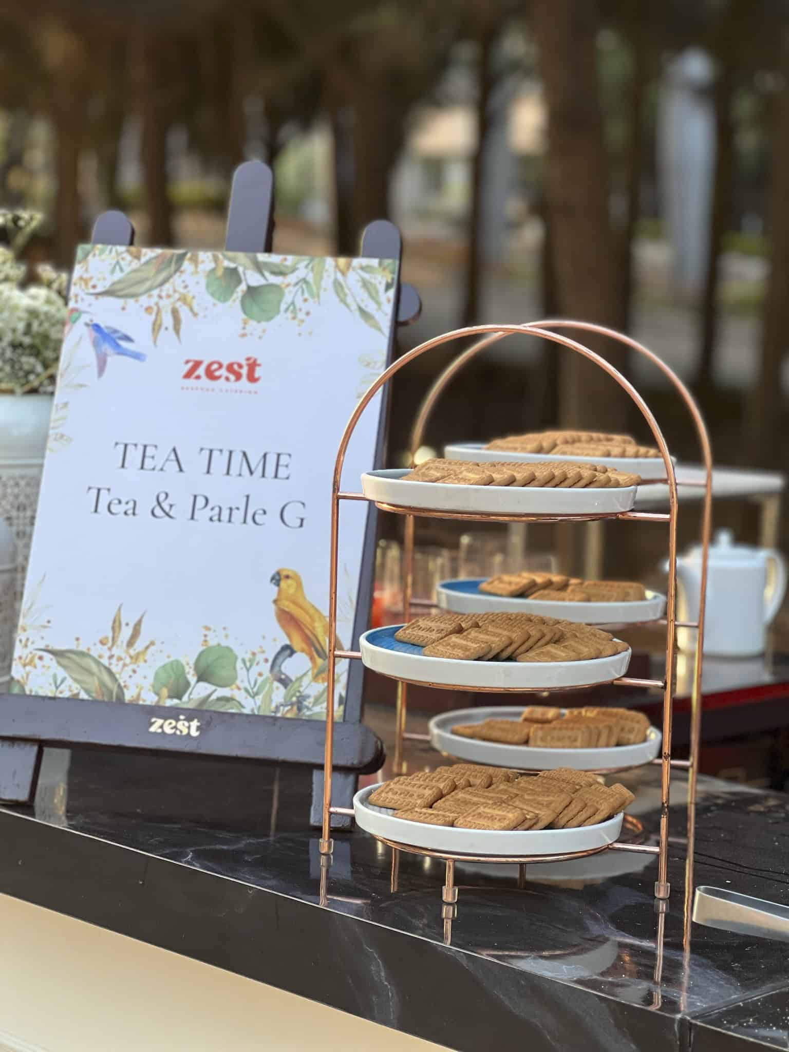 Divya Vithika Wedding Planners Reveal 2025's Top Wedding Trends: A New Era of Celebrations 4 Nostalgic comfort foods like Parle-G biscuits savored during tea time. Image courtesy: Divya Vithika Wedding Planners