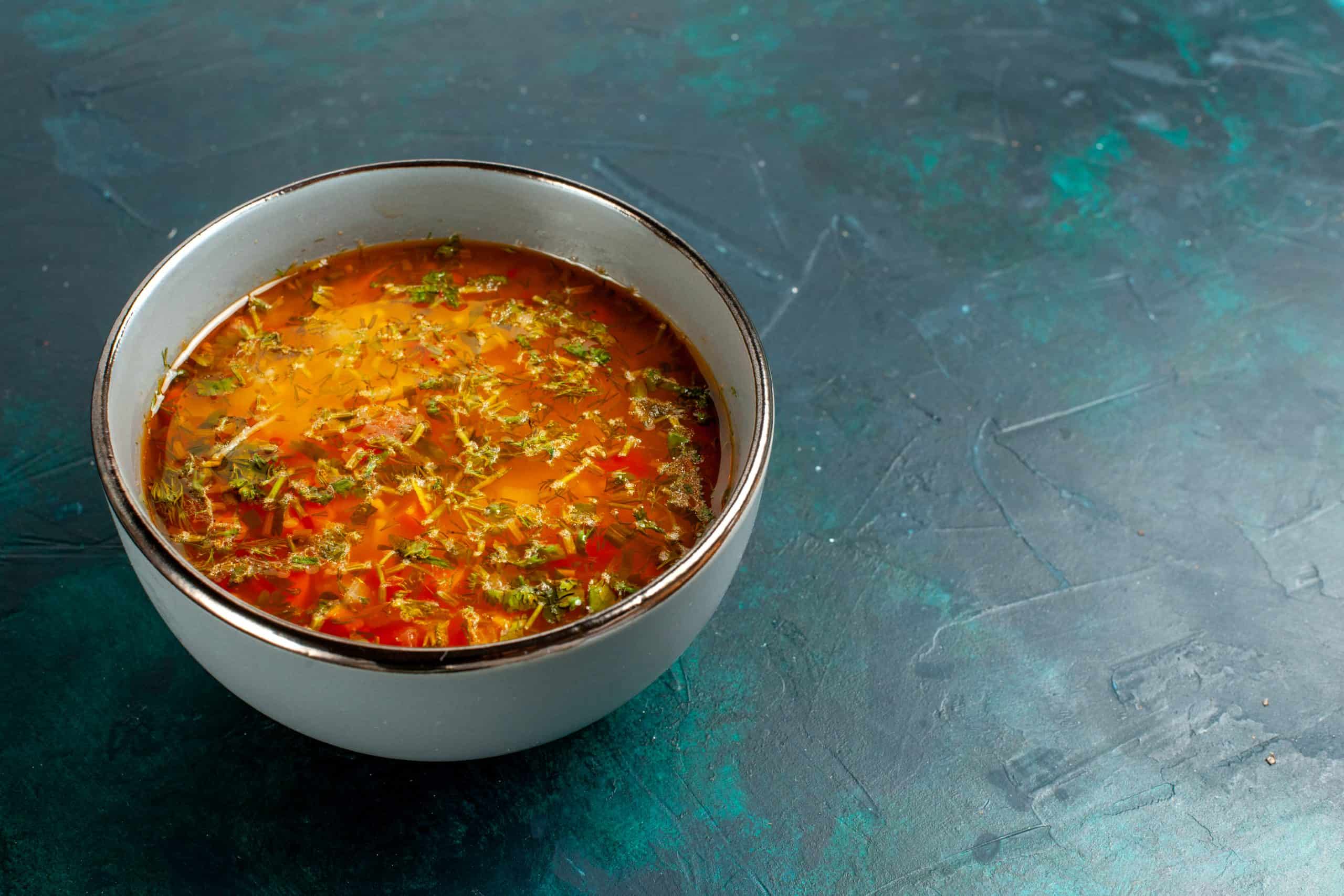 Chicken Chettinad Rasam is a distinctive South Indian soup that beautifully fuses the fiery flavours of Chettinad cuisine with the comforting tang of rasam. Image courtesy: Kamran Aydinov via freepik.com