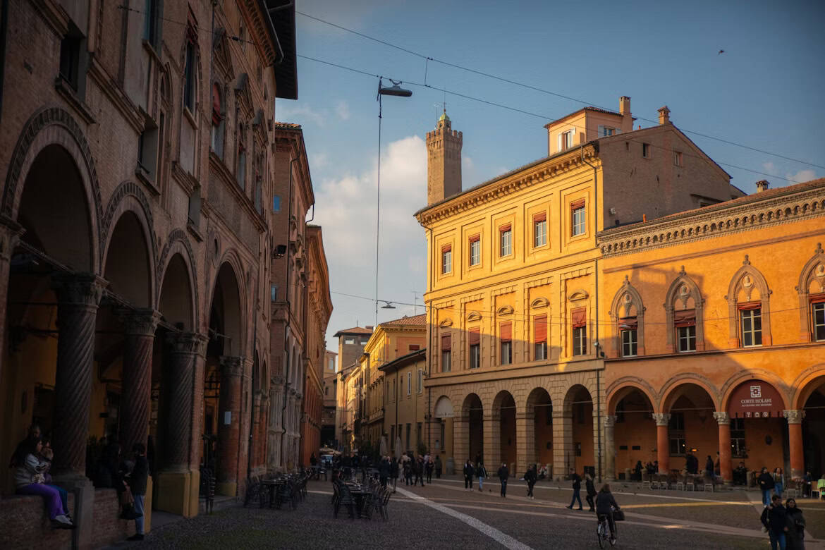 Bologna is a city where layered history and culture meet the joyful spirit of European summer. Image courtesy: Ryan Lad via Unsplash