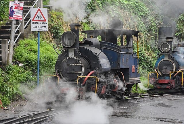 All aboard for scenic splendour! These six unforgettable train trips span misty mountains, lush valleys, and historic tracks, offering a front-row seat to the world’s most breathtaking landscapes, from India and Cambodia to Portugal, Switzerland, Australia, and the USA. Courtesy: Syed Sajidul Islam, Wikimedia