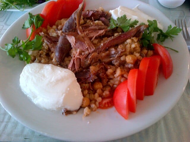 Keşkek is a substantial, slow-cooked stew made with wheat and pork. Mage Courtesy: E4024, Wikimedia