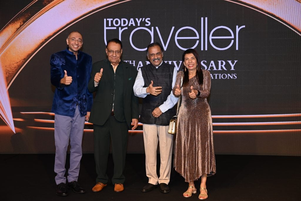 Arjun Gill, Managing Editor, Today’s Traveller, and CEO, Gill India Group; Kamal Gill, Executive Editor, Today’s Traveller, and Managing Director, Gill India Group; Kewal Gill, Chairman, Today’s Traveller, and Chairman, Gill India Group; and Chief Guest Shri Rajendra Menon, Chairperson of the Armed Forces Tribunal and Former Chief Justice of Delhi and Patna High Court, share a cheerful thumbs-up moment at the Today’s Traveller Awards 2025.