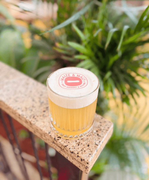 A tropical-meets-winter creation, Nannari Solstice blends the warmth of gold rum with the spiced kick of cinnamon whiskey. Fresh pineapple and lime introduce citrus brightness, while a herbal nannari foam adds a frosted top layer. Finished with M&M rice paper, this cocktail is equal parts vibrant, aromatic and visually festive.