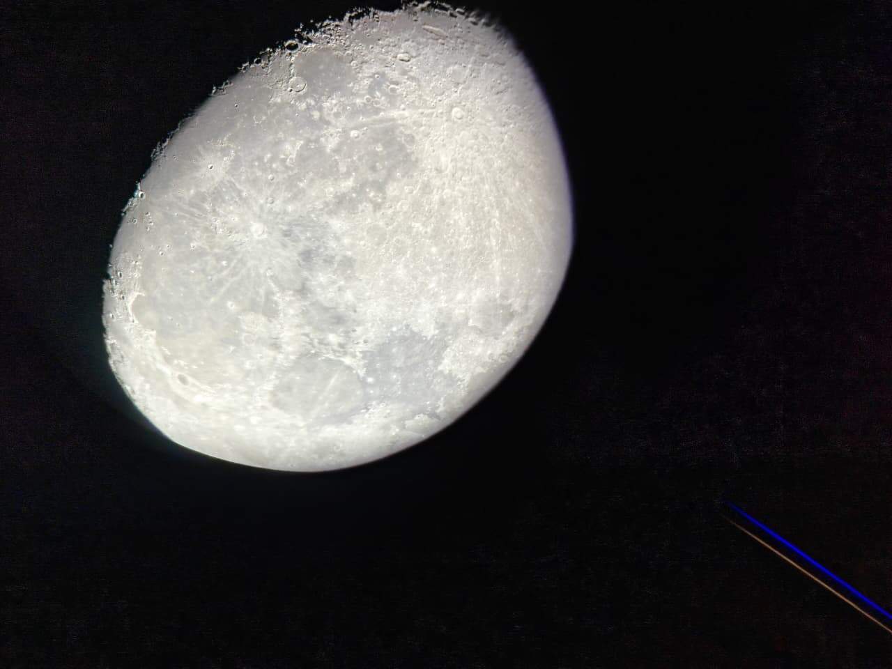 A striking close-up view of the Moon captured during the Astro Tourism Experience at Samburu Sopa Lodge, showcasing detailed lunar craters through high-powered telescopes.