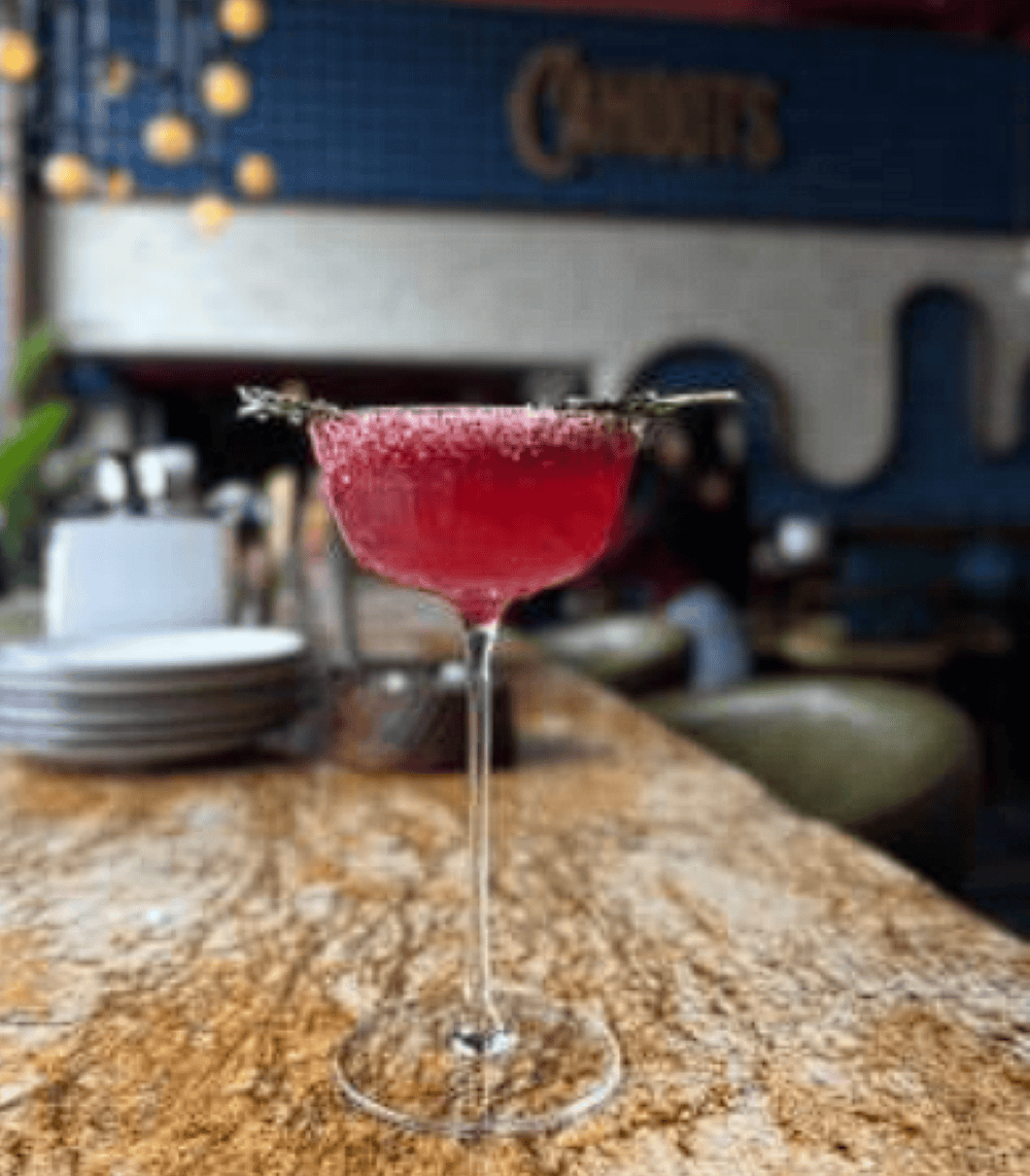 Playful, vibrant and winter-ready, the Winter Buster pairs vodka with berry-forward flavours, bringing together strawberry crush, cranberry juice and a touch of lime. The optional egg white creates a silky foam, while a dash of blue curaçao offers a striking visual contrast. It is a lively winter drink with a pink hue, refreshing tartness and a festive charm.