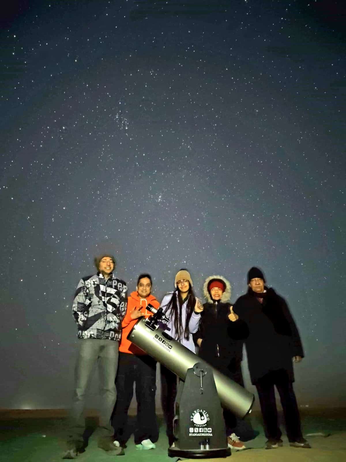 Stargazing in the Rann, where the desert sky turns the night into a shared wonder.