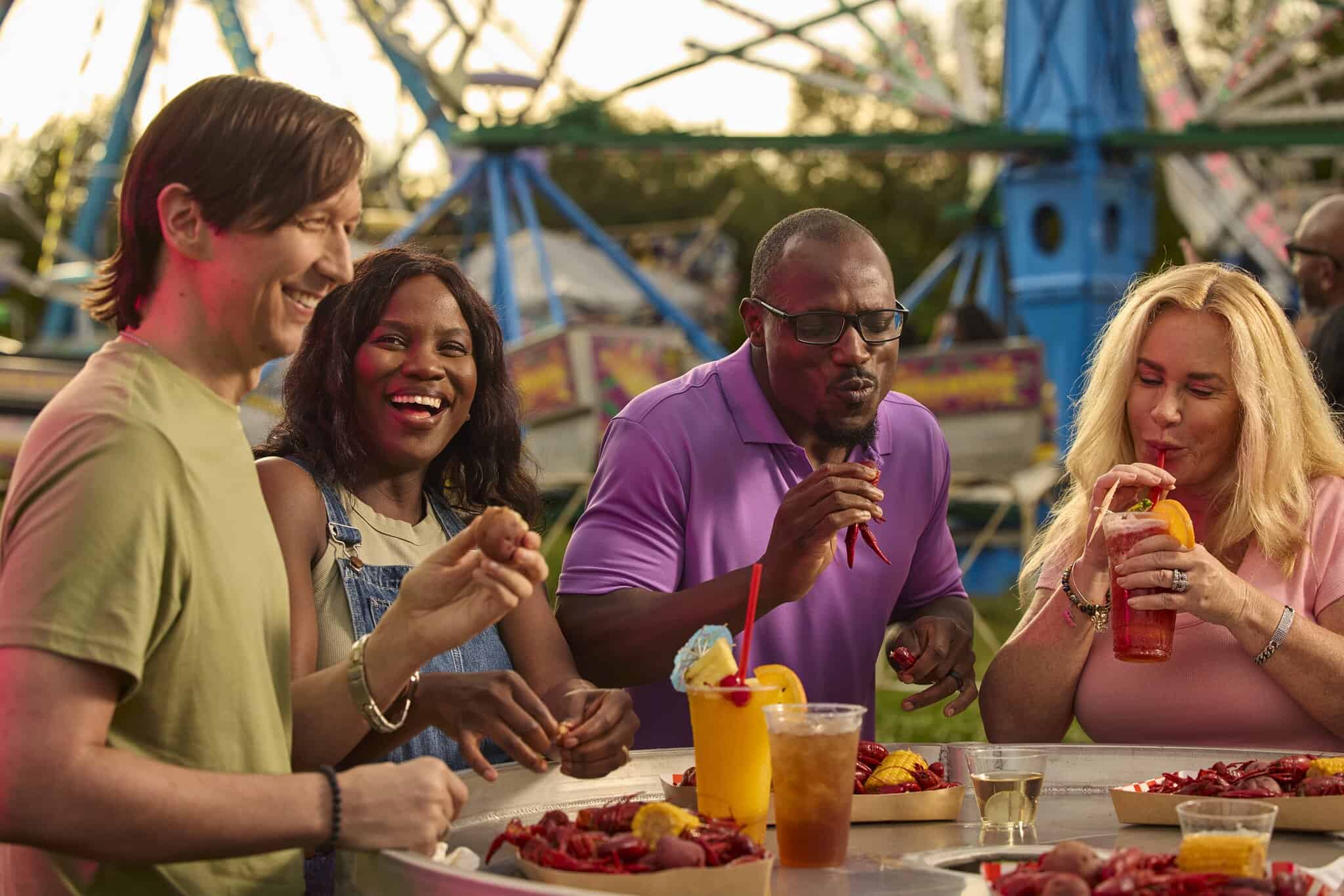 People gather over crawfish and drinks as Louisiana’s festive spirit lights up the evening