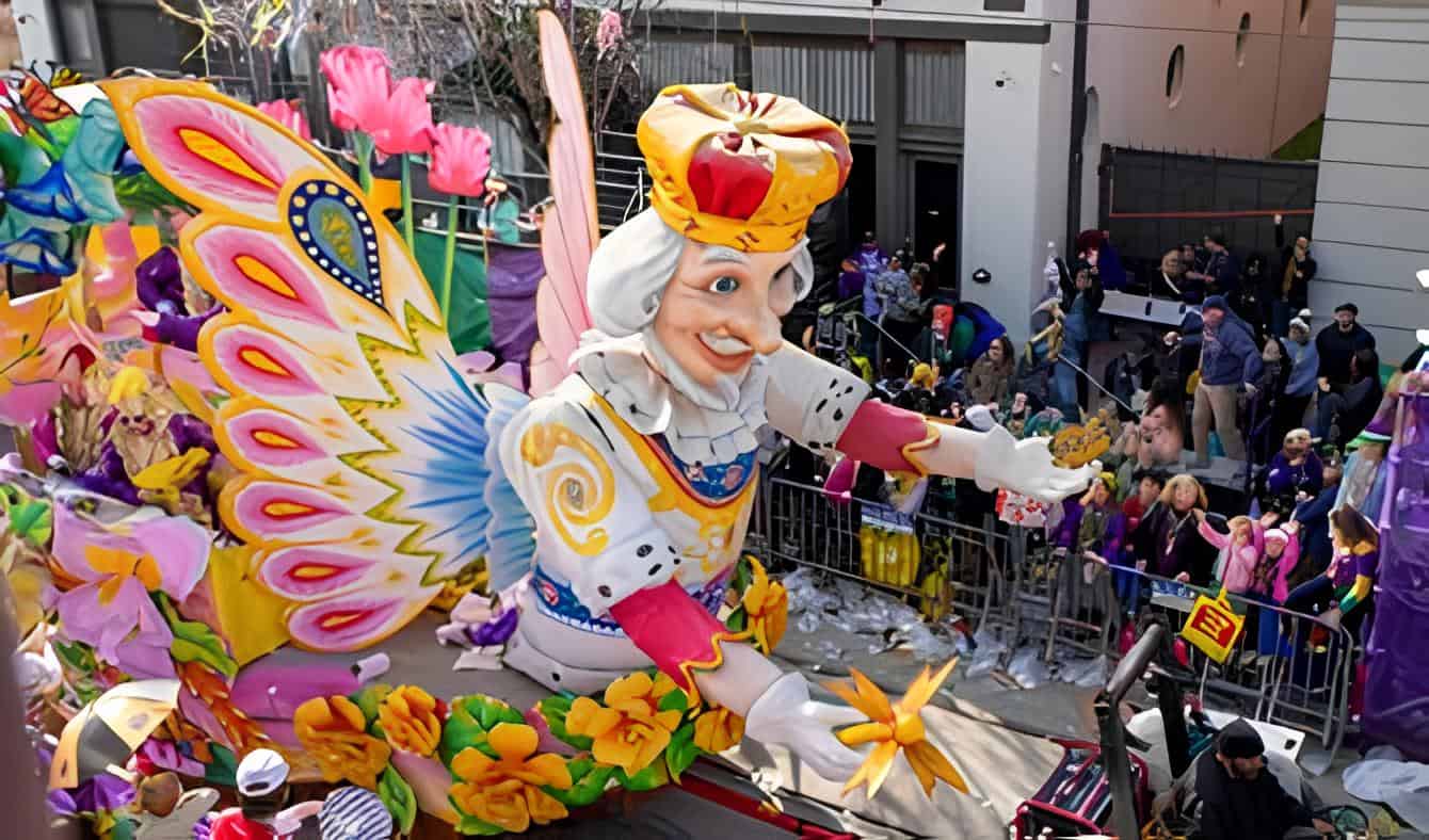 A vibrant Mardi Gras float fills the streets with colour, fantasy, and New Orleans celebration