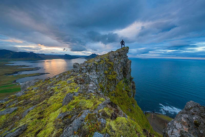 A dramatic cliffside view captures the rare thrill of remote hotels and hard-won luxury escapes. Image Courtesy: Hotel Djúpavík, Iceland