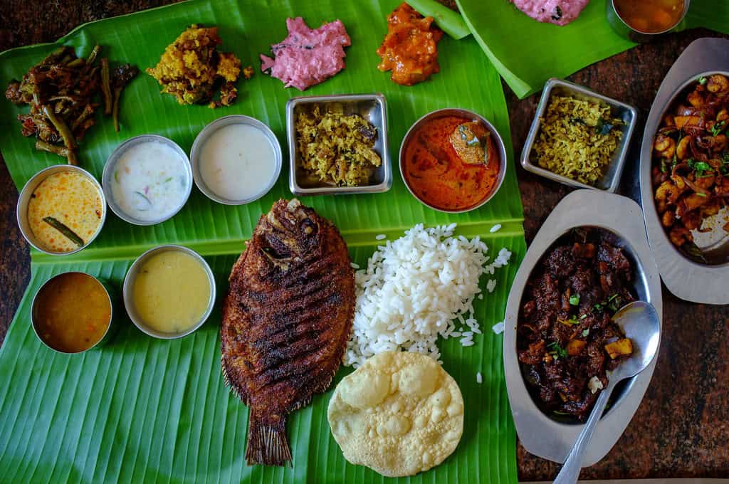 Fish thali on a banana leaf in Alappuzha, Kerala, Flickr Credit: Premshree Pillai