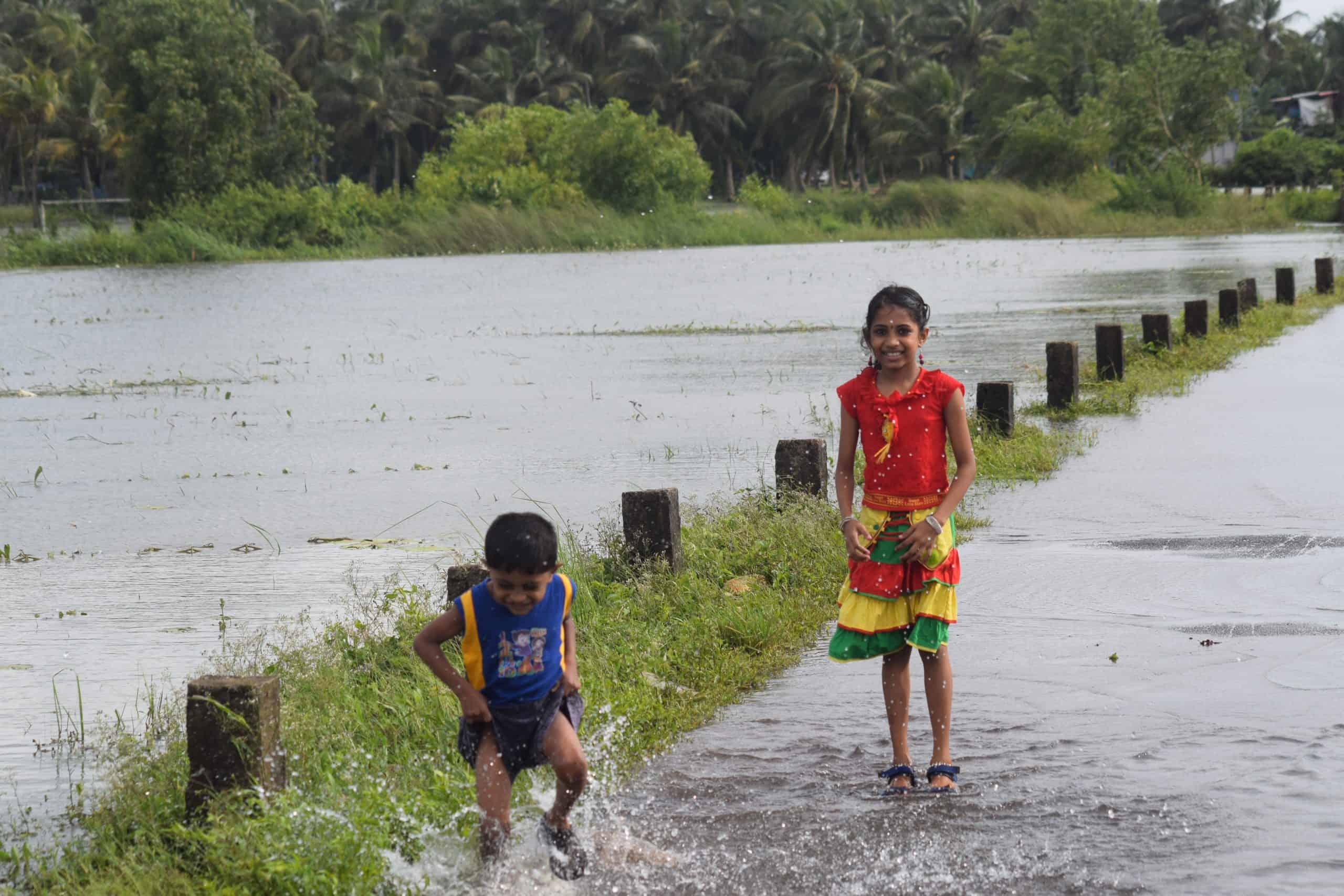 Children Playing during monsoon. Courtesy: Wikimedia Commons