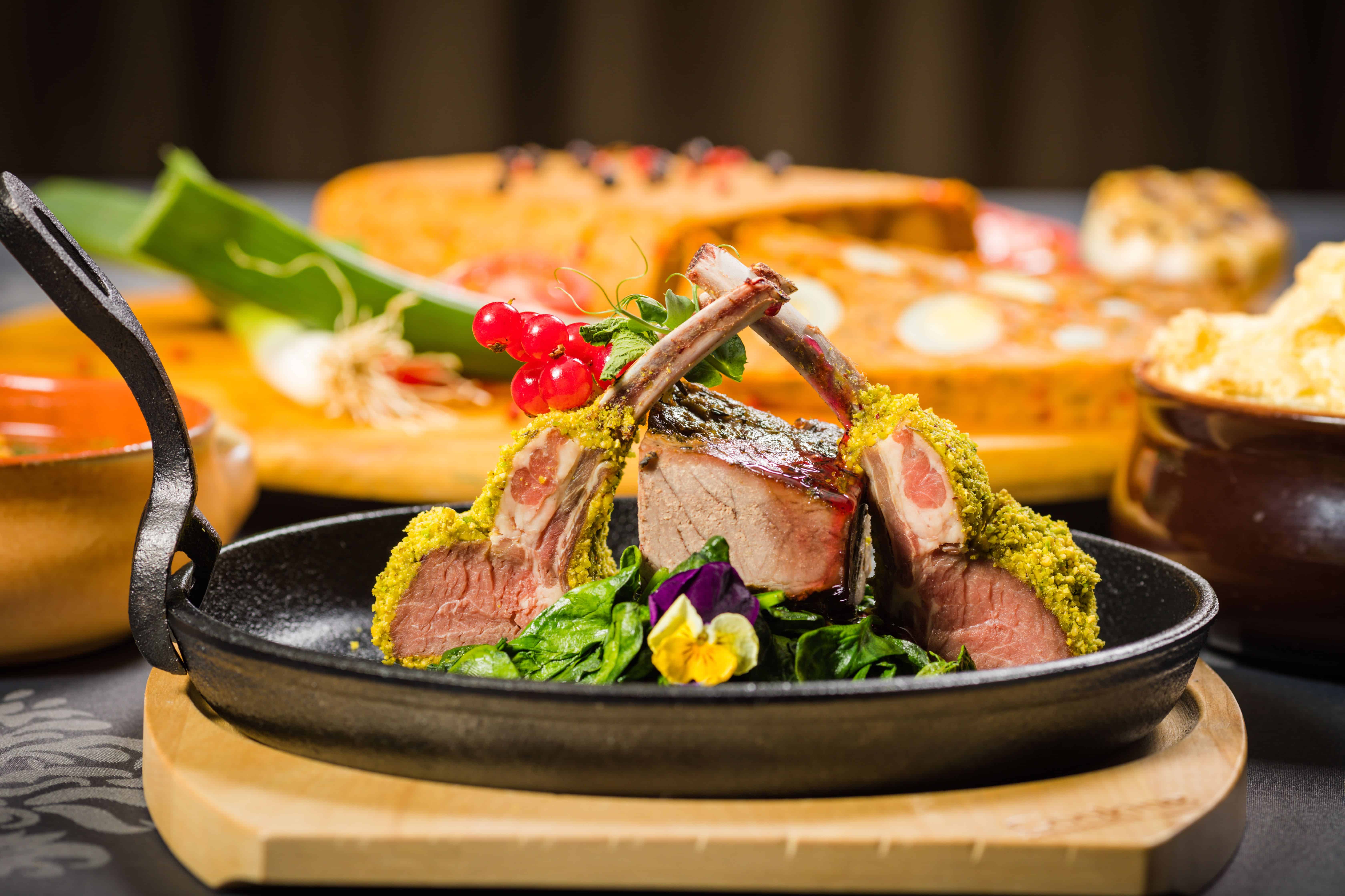 Delicious gourmet lamb rack with vegetables. Courtesy: Andrei Marina, Pexels
