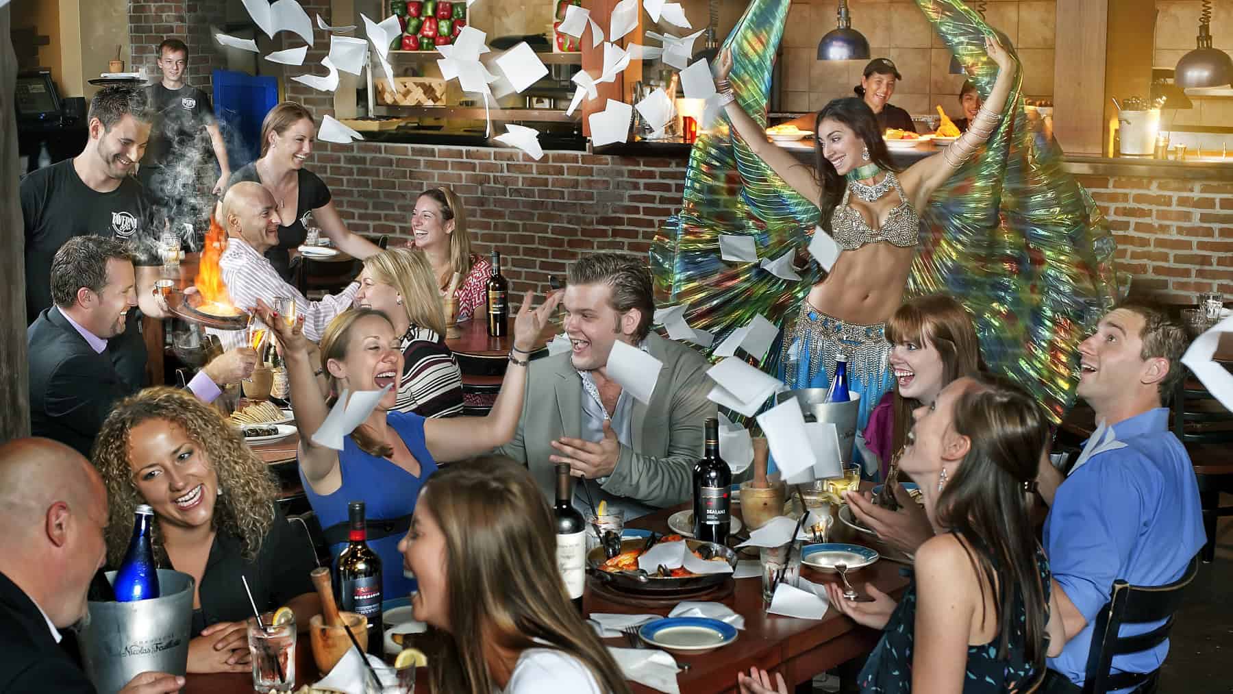 Photo of belly dancer and diners at Taverna Opa. Courtesy: Experience Kissimmee