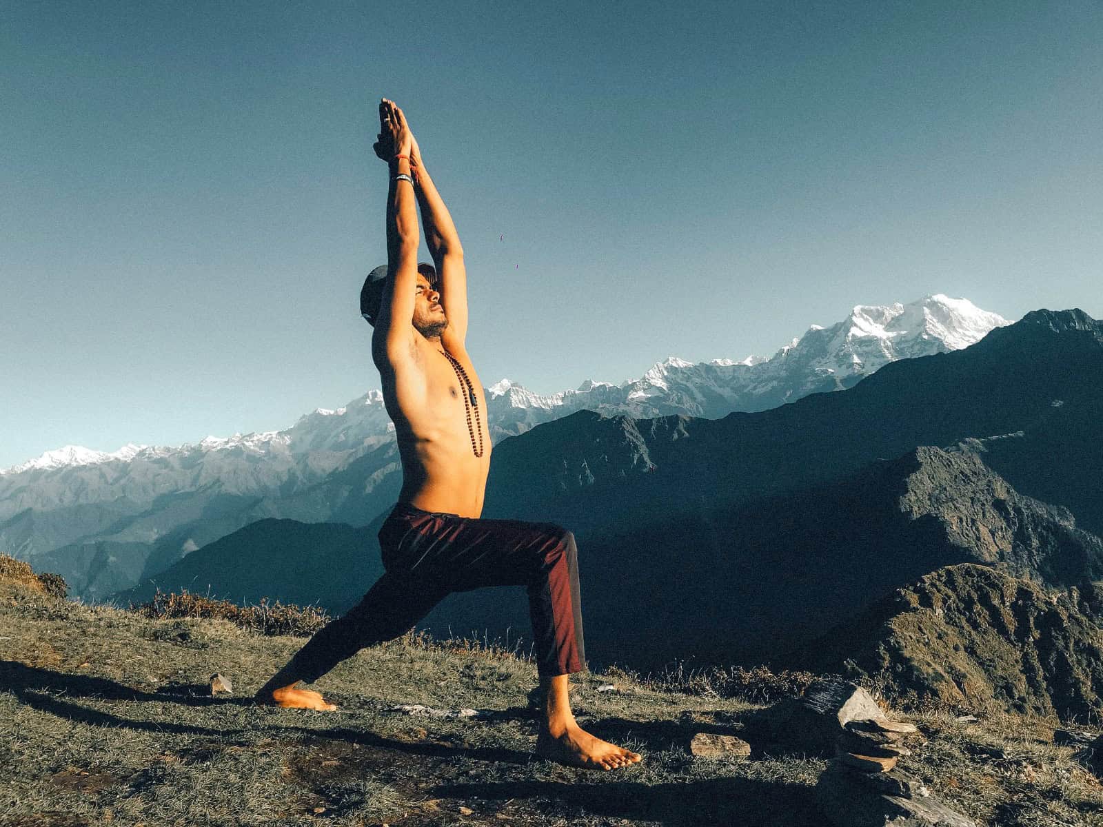 Yoga Outdoors Against a Backdrop of Snowcapped Mountains.
Image Courtesy: Abhishek Gaur, Pexels
