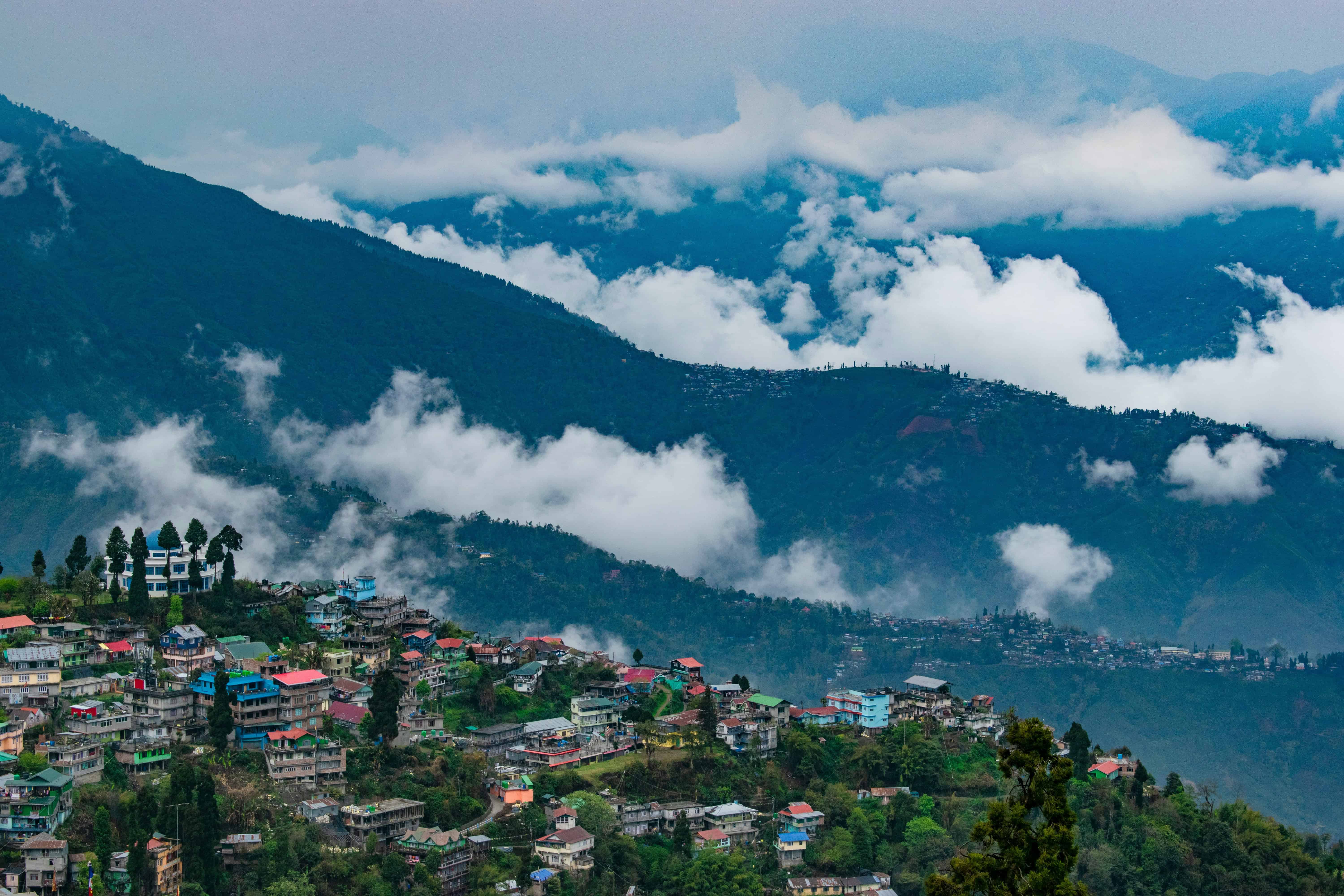 The cloud-kissed hills of Darjeeling. Image courtesy: Joy Amed, Unsplash