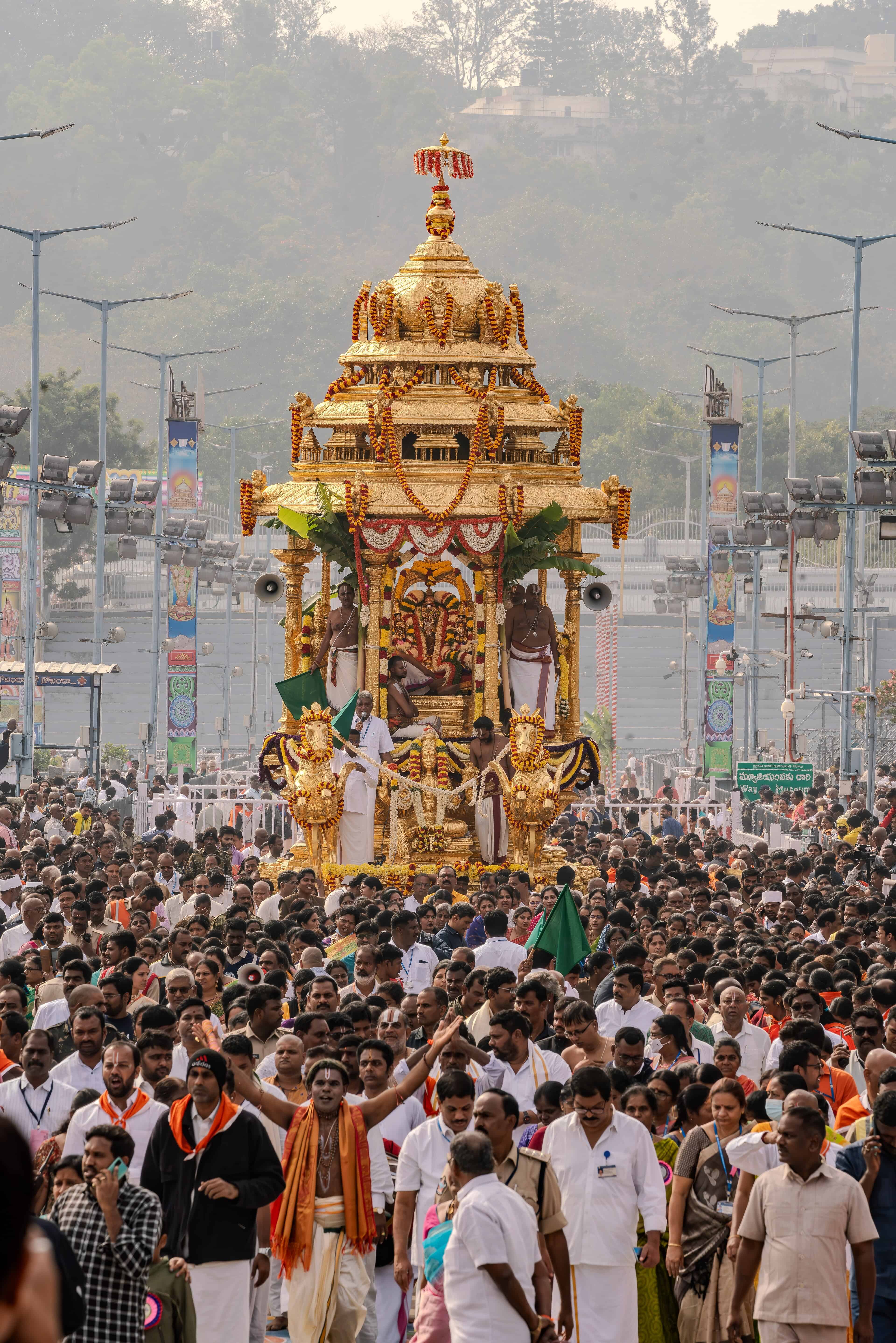 A deity in procession at Tirumala Temple, one of the best temples to visit in South India. Image Courtesy: Wikimedia Commons