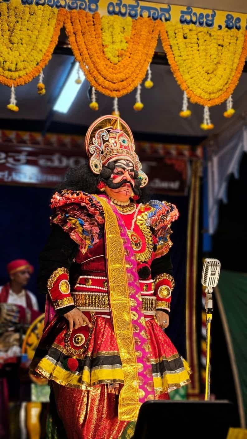 Spectacular Yakshagana performer in vibrant costume during a traditional cultural event in Udupi, India. Courtesy, Hrathvik Shetty, Pexels