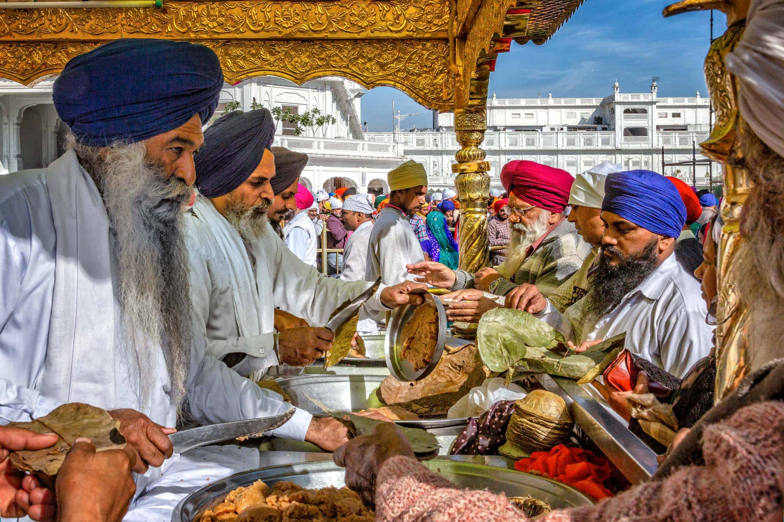 Karah prashad is distributed equally after Sikh worship, Image courtesy: Loius Montrose Photography